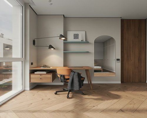 A comfortable home office workspace with good natural lighting in an apartment